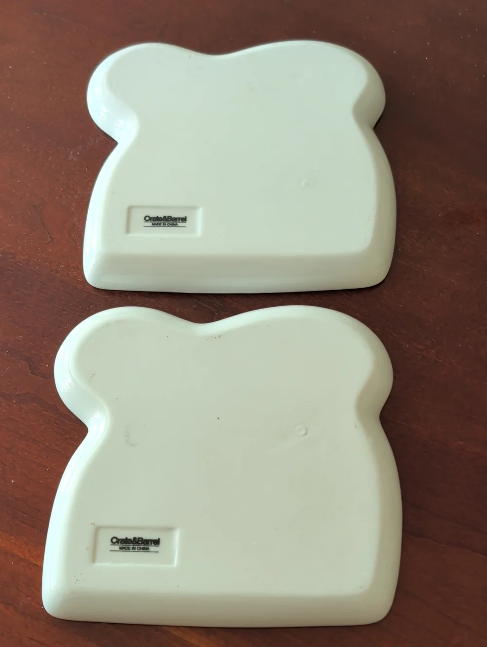 Crate&Barrel Set Of 2 White Ceramic Bread Shaped Plates